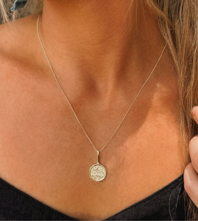 boho mountain necklace styling with linen dress and herringbone chain
