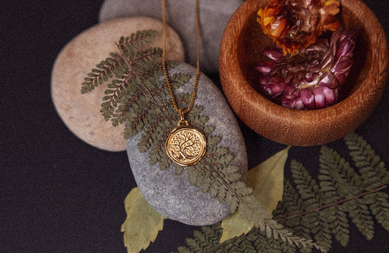 Tree of Life pendant close-up showing intricate details